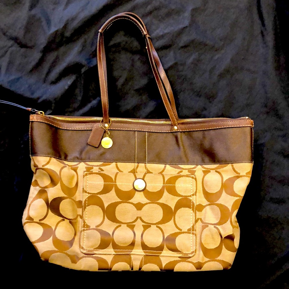 Authentic Coach signature C shoulder tote 20x14 . Gently loved. Brown and tan